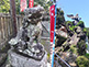 Stone Statue Komainu along the hiking trail leading to Hansobo in Kenchoji Temple