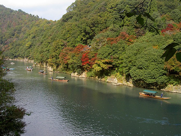 Boats on Katsura River in Arashiyama Kyoto