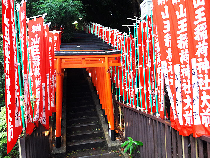 Red Torii Gates (Inari Sando) at Akasaka Hie Shrine in Tokyo