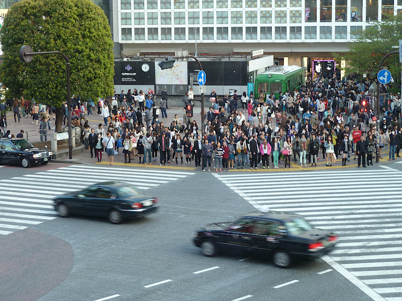 Shibuya Crossing Taxis and People in Tokyo