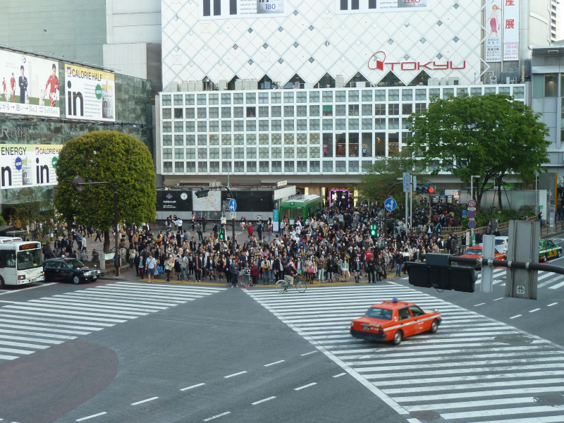 Shibuya Crossing with Cars in Tokyo